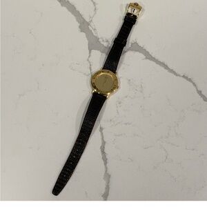 Authentic Vintage 90s Gucci Casual Black & Gold
Roman Numerals 3000.2.L